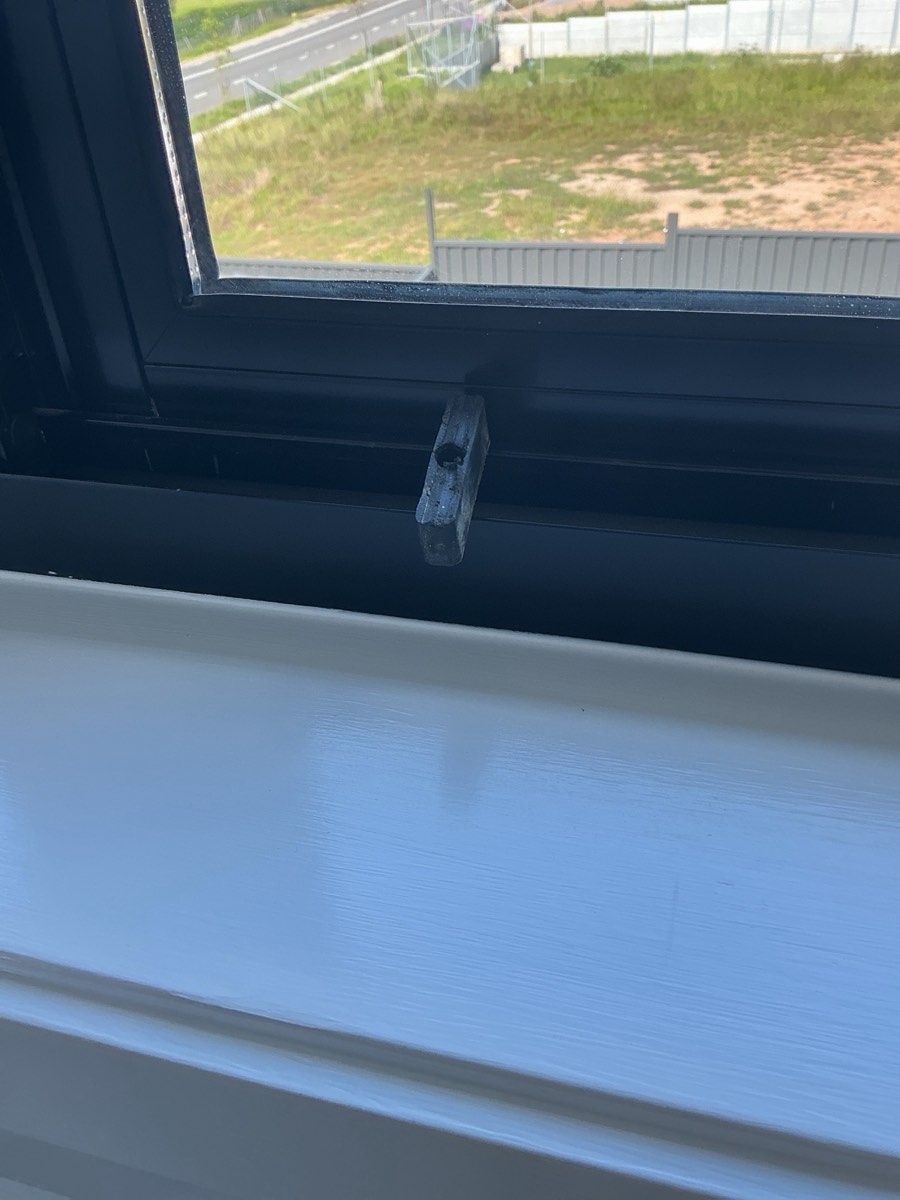 Opening restriction required to a first floor window, recorded during a handover inspection in Leppington